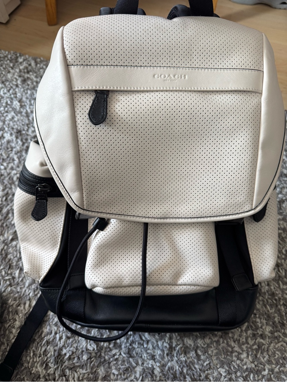 Coach Two-Tone Perforated Leather Backpack in White and Black